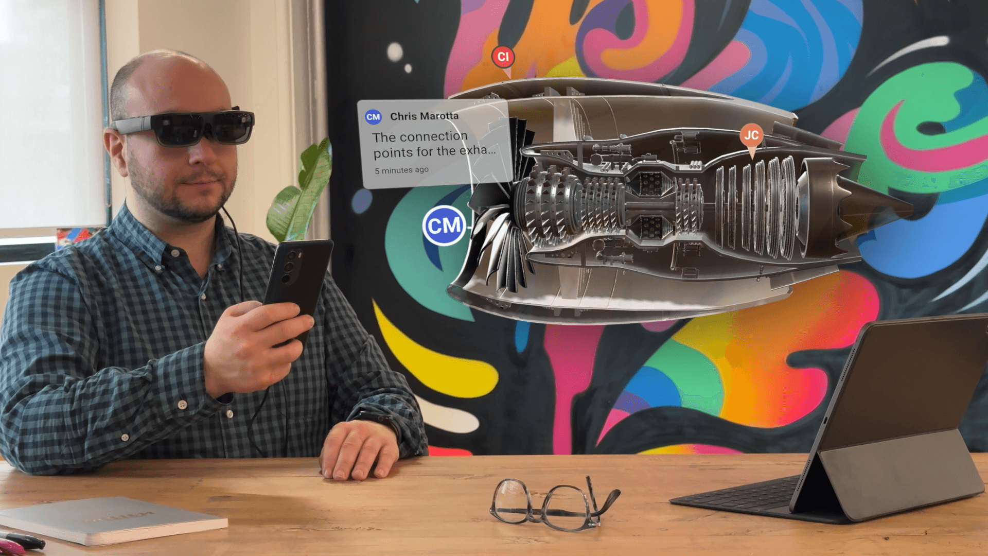 Wearing the ThinkReality A3 and interacting with (simulated) AR objects through the Moto Edge30 Developer Kit.