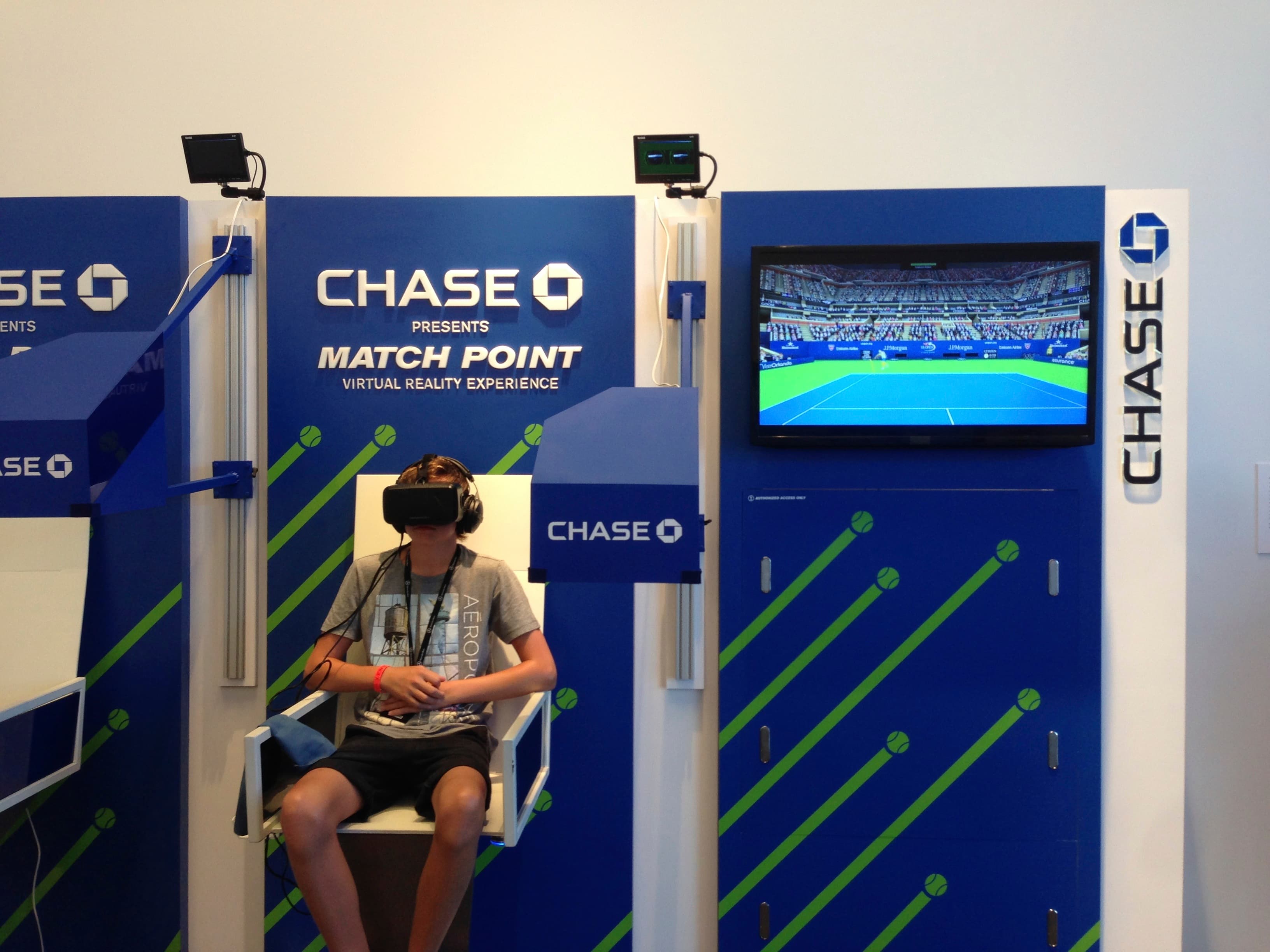 Lounge installation showing the haptic feedback chair and armature.