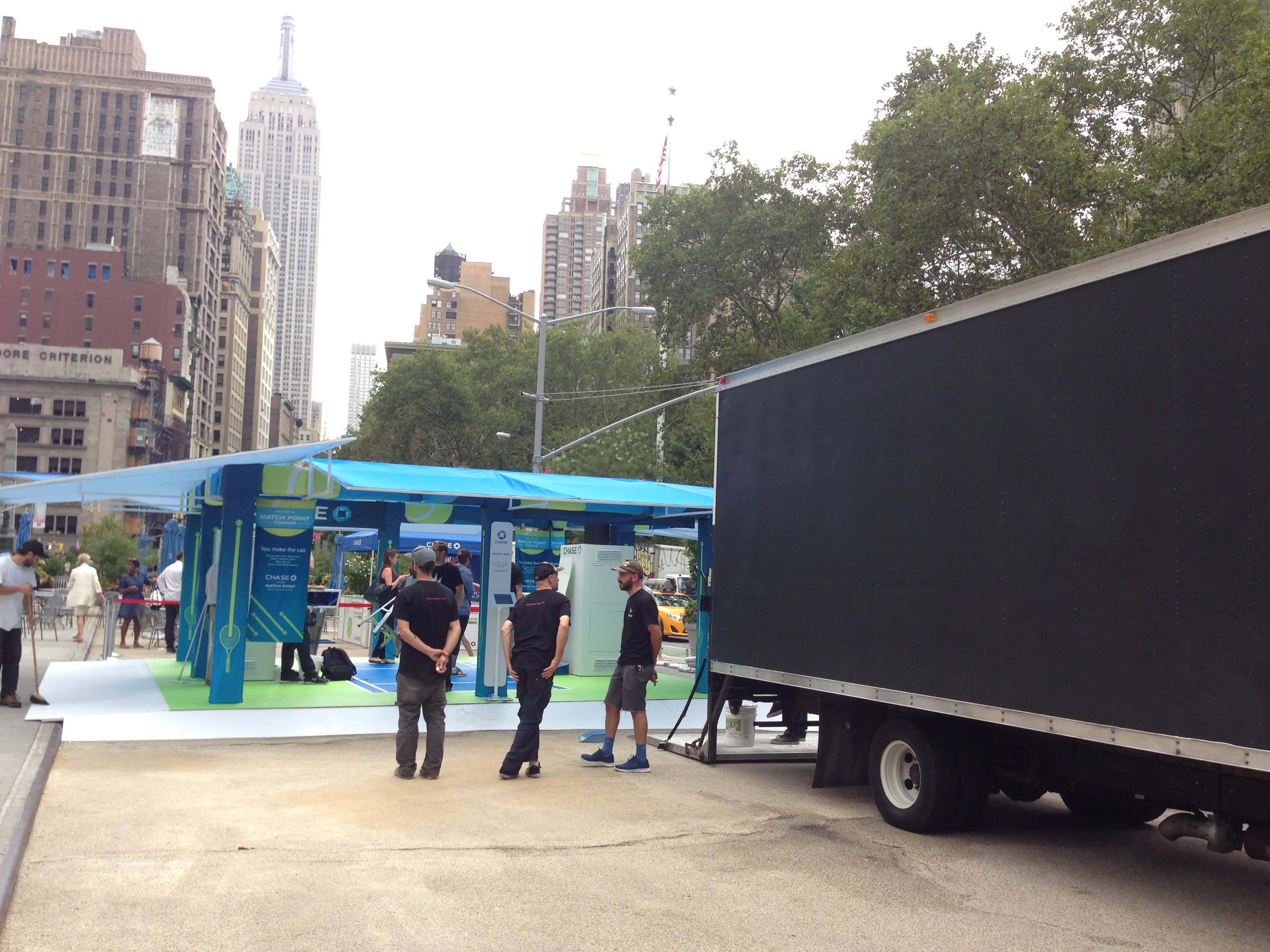 Load-in at Flatiron Plaza.